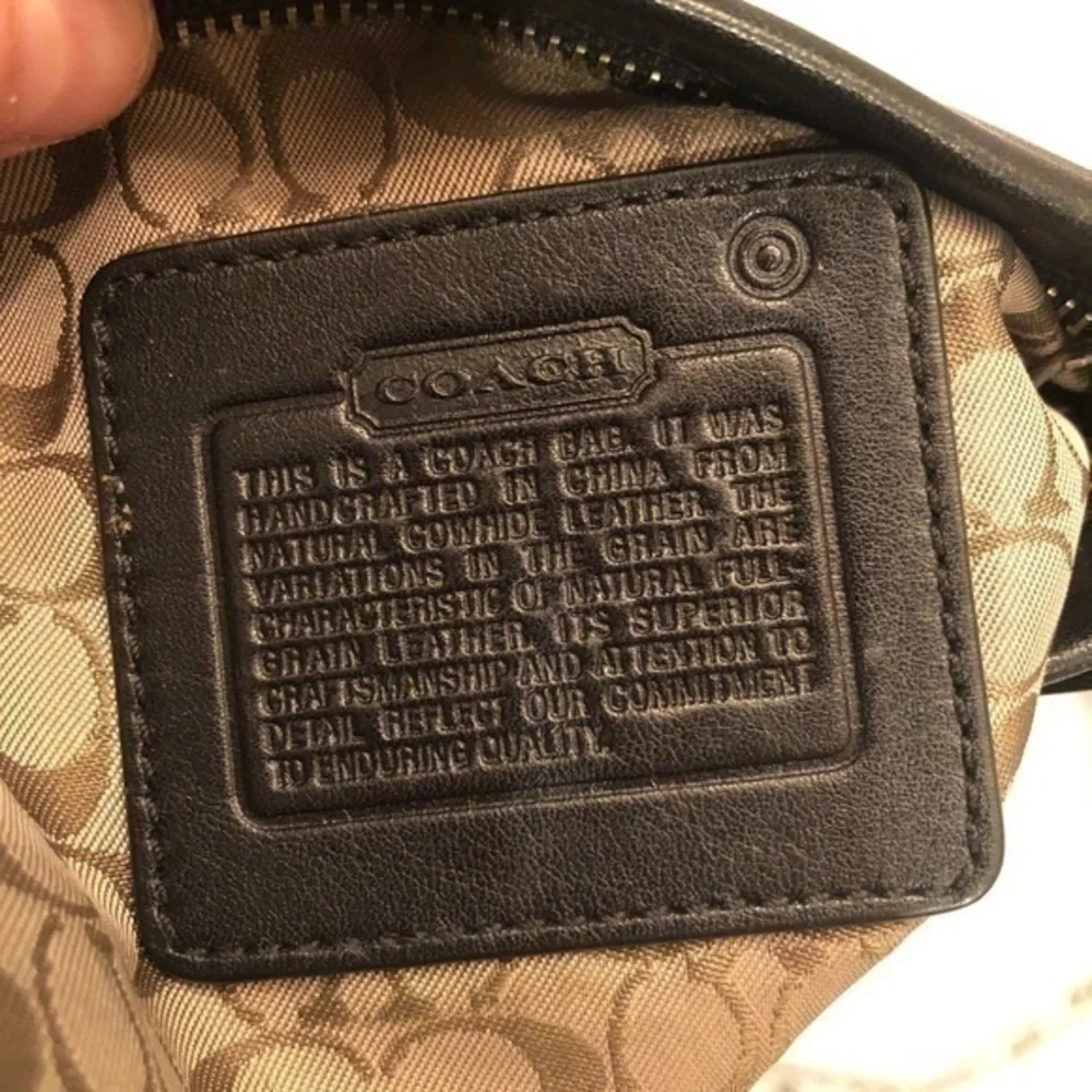 Coach black leather mini tote bag